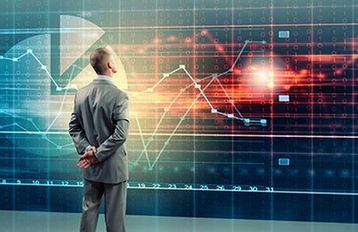 Analyst observing market data insights